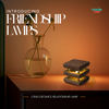 mini mid century kona friendship Lamp casting ambient glow in dark or cozy environment