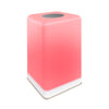 A pink FriendLi friendship lamp with a white base, likely a FriendLi Friendship Lamp, which allows for connectivity with other lamps via a subscription service.