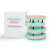 Packaging of Mid-Century white & black friendship lamp with included accessories